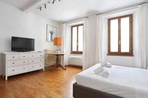 Postel nebo postele na pokoji v ubytování Appartamento La Terrazza Firenze centro storico