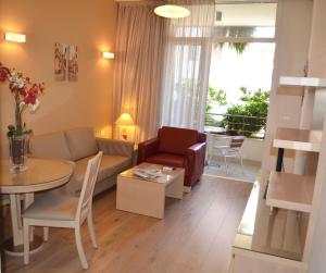Posezení v ubytování Nest 1 Hotel