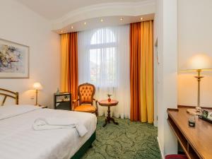 Postel nebo postele na pokoji v ubytování Hotel Palmenhof