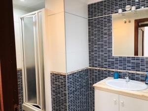 Kúpeľňa v ubytovaní Apartamento Arosa Playa