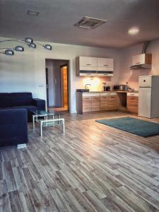 A kitchen or kitchenette at Moment Apartments
