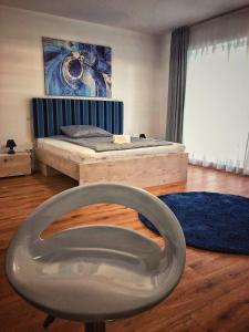 A bed or beds in a room at Moment Apartments