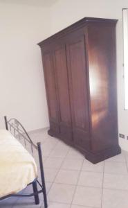 A bed or beds in a room at Casa di Vacanza Marina di Davoli