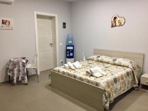 A bed or beds in a room at B&B San Francesco di Paola