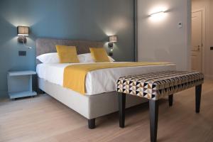 A bed or beds in a room at Domus Alberico