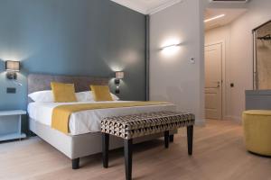 A bed or beds in a room at Domus Alberico