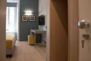 A bed or beds in a room at Domus Alberico
