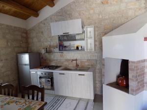 Kuchyň nebo kuchyňský kout v ubytování Buen Retiro Modica
