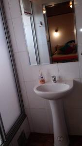 Kylpyhuone majoituspaikassa Hostal Casa Blanca