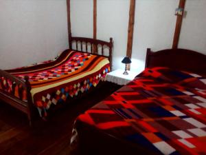Postel nebo postele na pokoji v ubytování La Posada del Cucú