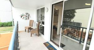 
A balcony or terrace at West Beach Lagoon 210 – Amazing Views
