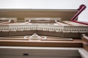 a model of a piano in a room at Бутик-Отель "Доходный Дом Листратовой" in Irkutsk