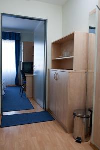 Kuchyň nebo kuchyňský kout v ubytování Hotel Kerpely