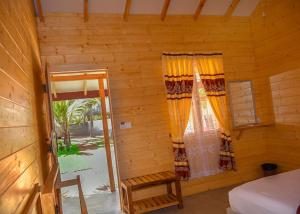 Voodi või voodid majutusasutuse Trinco Relax Hut toas