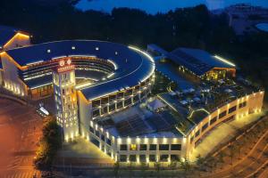 an overhead view of a building at night at Beijing Yun-zen Jinling Lotus Hotel in Beijing