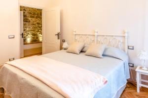 Posteľ alebo postele v izbe v ubytovaní Borgo Sant'Andrea al Pozzo