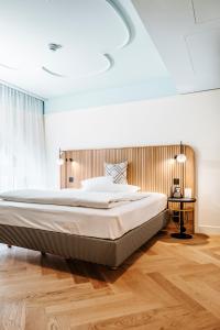 Una cama o camas en una habitación de Best Western Plus Hotel Bern
