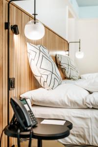 Una cama o camas en una habitación de Best Western Plus Hotel Bern