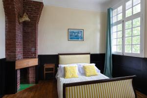 Postel nebo postele na pokoji v ubytování Villa Des Dunes
