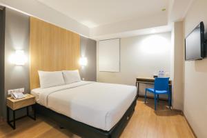 Postel nebo postele na pokoji v ubytování Hotel Citradream Bintaro + 37 fotografií