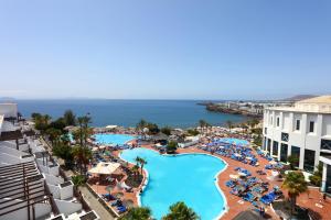 an aerial view of a resort with a swimming pool at Sandos Papagayo in Playa Blanca