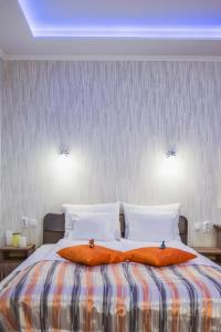 Postel nebo postele na pokoji v ubytování Belien Apartman
