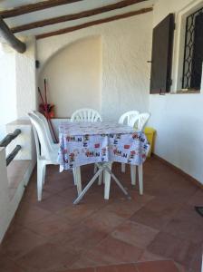 A seating area at Residence La Conia