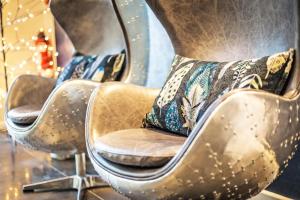 an image of two chairs in a store at Easy Living in List