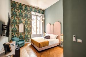 A bed or beds in a room at Glance in Rome