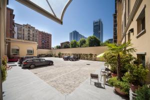 a parking lot with cars parked in a building at Residence Star in Turin