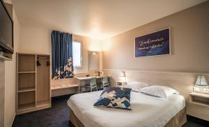 Postel nebo postele na pokoji v ubytování Ace Hotel Riom