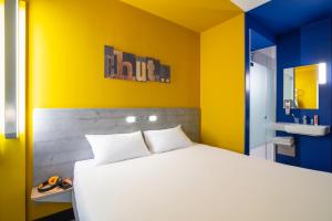 Postel nebo postele na pokoji v ubytování ibis budget Amsterdam Airport