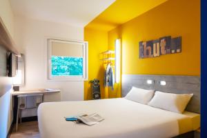 Postel nebo postele na pokoji v ubytování ibis budget Amsterdam Airport