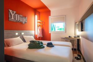 Postel nebo postele na pokoji v ubytování ibis budget Amsterdam Airport