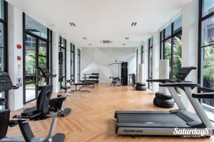 a gym with treadmills and elliptical machines at Saturdays Residence by Brown Starling in Rawai Beach