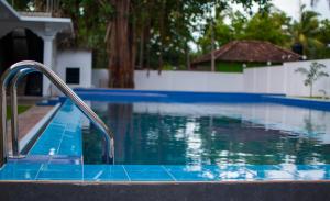 The swimming pool at or close to MRD Beach Hotel