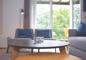 Ein Sitzbereich in der Unterkunft Ferienwohnung Windherz