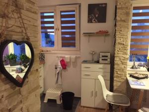 Kuchyňa alebo kuchynka v ubytovaní Wyjątkowy apartament w sercu Piły