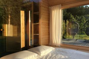 Postel nebo postele na pokoji v ubytování Citi Krasti Eco Spa Residence