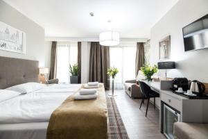 Posteľ alebo postele v izbe v ubytovaní Hotel Perfect