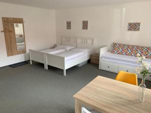 En eller flere senger på et rom på Mikulov Inn - Apartments Slunce