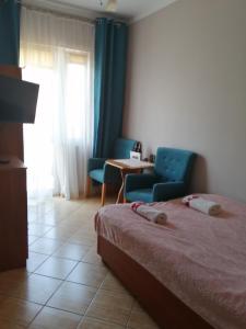 Postel nebo postele na pokoji v ubytování Pensjonat Gorzowiak