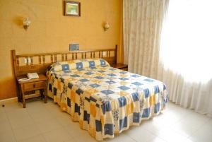 Posteľ alebo postele v izbe v ubytovaní Hotel Maruxa