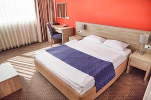 Postel nebo postele na pokoji v ubytování Hotel Putnik