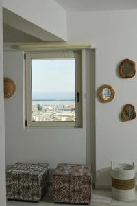 A seating area at Rethymno City View Apartment