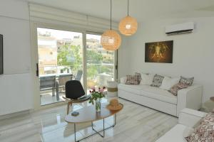 A seating area at Rethymno City View Apartment Még 17 kép