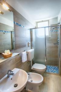 Koupelna v ubytování Hotel Meritime