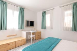 Postel nebo postele na pokoji v ubytování Monza House Otel