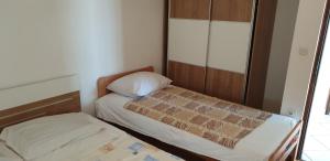 Postel nebo postele na pokoji v ubytování Apartments Vila Lavanda