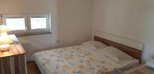 Postel nebo postele na pokoji v ubytování Apartments Vila Lavanda